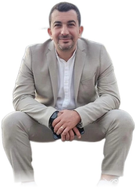 Charbel Assaf sitting in a beige suit